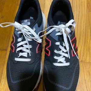 New Balance tennis shoes.